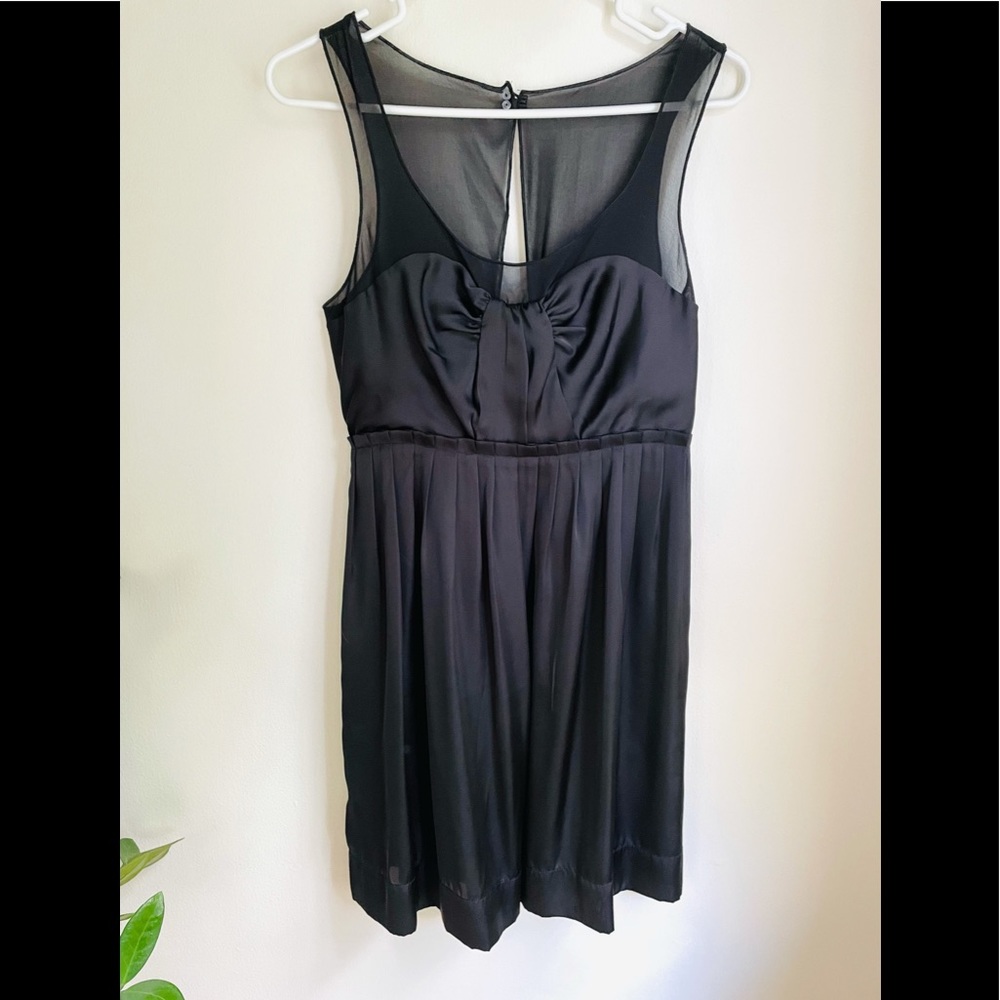 American Eagle size 6 black satin and sheer details with button back
